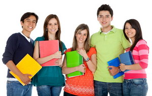 Group of students holding notebooks