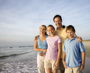 Smiling family on beach